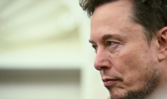 Elon Musk lors de la réception du président sud-africain Cyril Ramamphosa par Donald Trump dans le Bureau ovale de la Maison Blanche, à Washington, le 21 mai 2025 ( AFP / Jim WATSON )