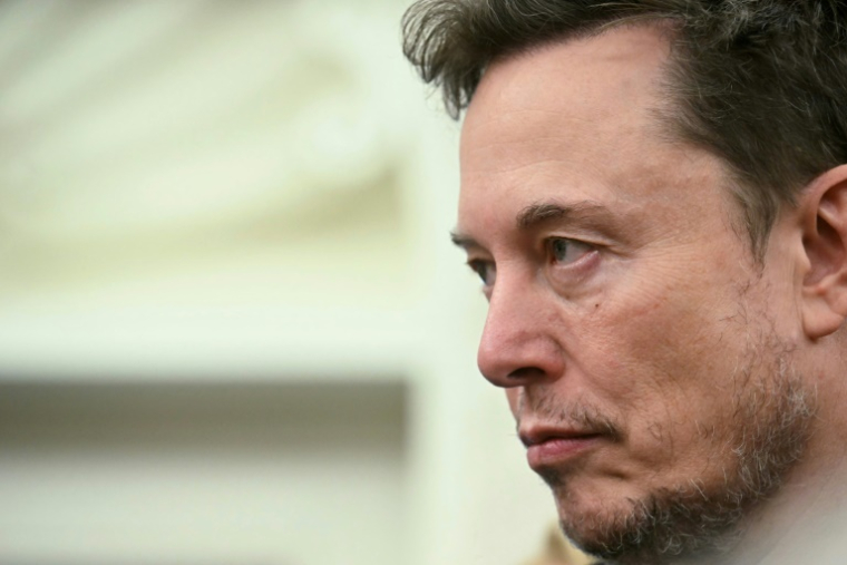Elon Musk lors de la réception du président sud-africain Cyril Ramamphosa par Donald Trump dans le Bureau ovale de la Maison Blanche, à Washington, le 21 mai 2025 ( AFP / Jim WATSON )