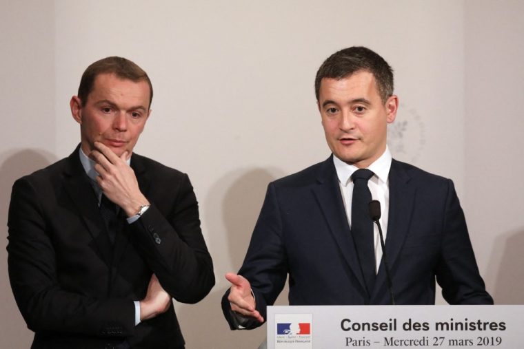 Olivier Dussopt et Gérald Darmanin à Paris, le 27 mars 2019. ( AFP / LUDOVIC MARIN )