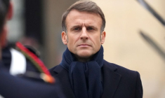 French President Emmanuel Macron attends a military ceremony with Kazakh President Kassym-Jomart Tokayev, at the Invalides monument in Paris