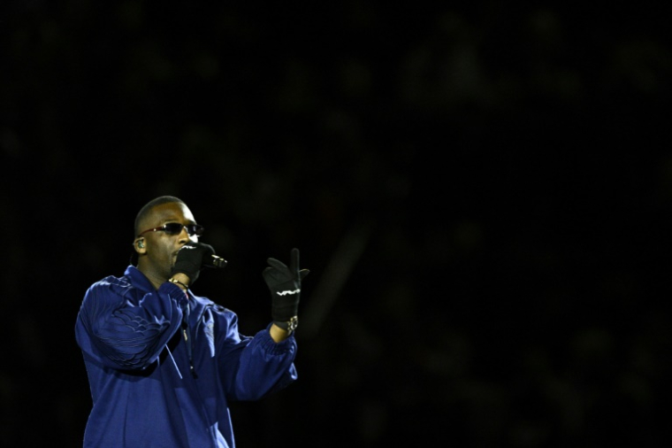 Le rappeur français SDM se produit au Parc des Princes avant une rencontre entre le PSG et l'OM, le 16 mars 2025 à Paris ( AFP / JULIEN DE ROSA )