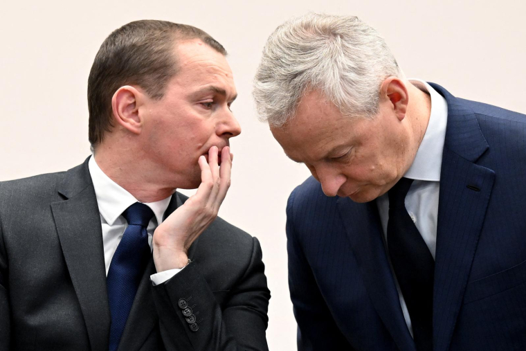 Le ministre du Travail Olivier Dussopt et le ministre de l'Economie Bruno Le Maire, le 10 janvier 2023, à Paris. ( POOL / BERTRAND GUAY )
