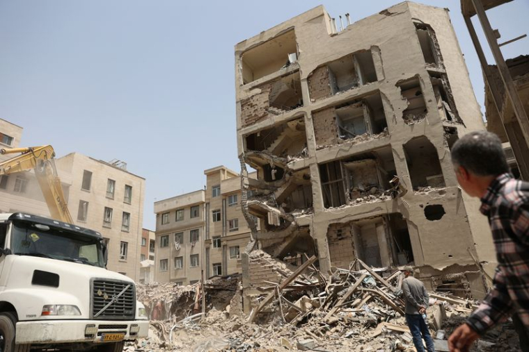 A view shows the aftermath of an Israeli strike on a building on Monday, after the ceasefire between Israel and Iran, in Tehran