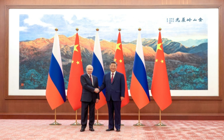Le président chinois Xi Jinping reçoit son homologue russe Vladimir Poutine à Pékin, le 20 mai 2026 ( POOL / Maxim Stulov )