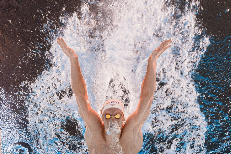 Léon Marchand à Saint-Denis le 15 août 2026 ( AFP / Sébastien BOZON )