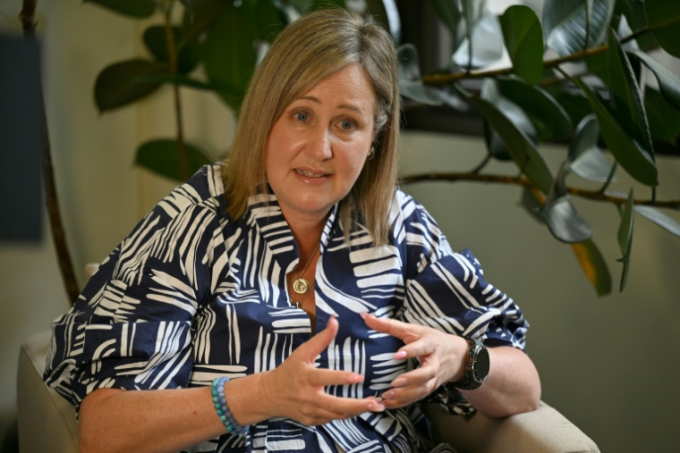 Mia Bannister, la mère d'Ollie Hughes, décédé à l'âge de 14 ans, lors d'une interview à Sydney, le 7 novembre 2025 en Australie ( AFP / Saeed KHAN )