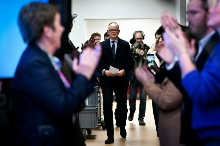 Edouard Philippe le 15 mars 2026 au Havre ( AFP / LOU BENOIST )