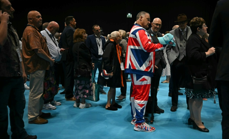 Des délégués assistent au deuxième jour du congrès annuel du parti Reform UK à Birmingham, dans le centre de l'Angleterre, le 4 septembre 2026 ( AFP / Paul ELLIS )