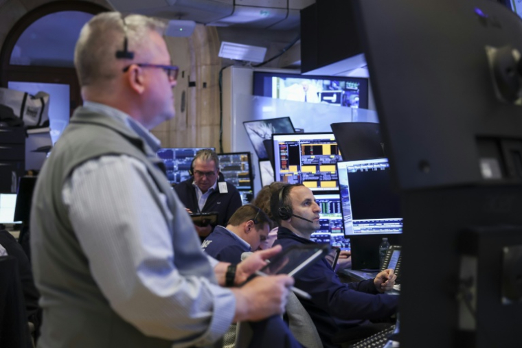 Des opérateurs à la Bourse de New York, le 11 mai 2026 ( AFP / ANGELA WEISS )