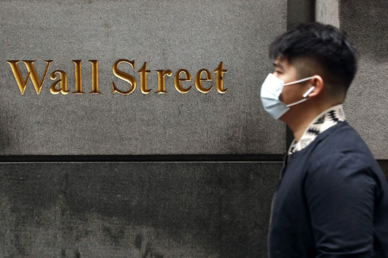 WALL STREET OUVRE EN HAUSSE