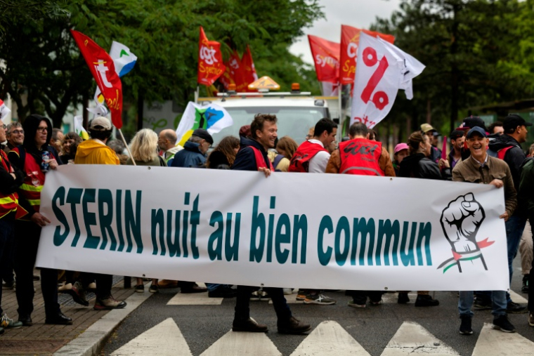 Des manifestants opposés à la tenue de la Nuit du bien commun, à Nantes, le 5 juin 2025 ( AFP / Fred TANNEAU )