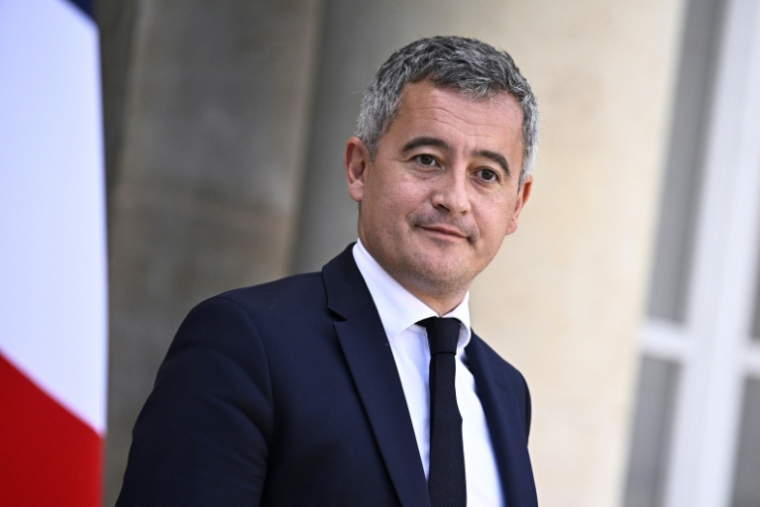 Le ministre de la Justice, Gérald Darmanin, à la sortie de l'Elysée, le 14 octobre 2025 à Paris ( AFP / JULIEN DE ROSA )