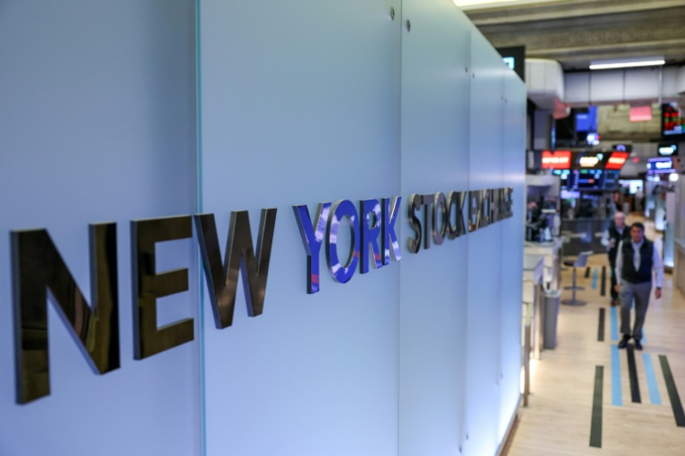 Des opérateurs à la Bourse de New York, le 18 mars 2026 ( AFP / ANGELA WEISS )