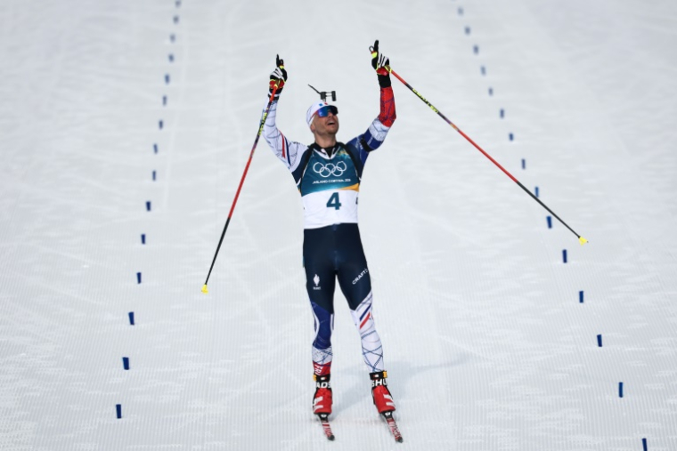 Le biathlète français Emilien Jacquelin décroche la médaille de bronze de la poursuite, aux JO de Milan Cortina, le 15 février 2026 à Anterselva ( AFP / FRANCK FIFE )