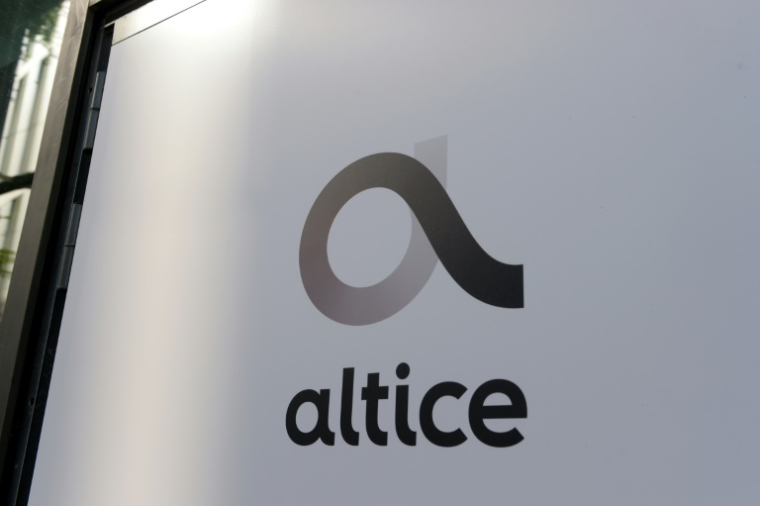 Logo du groupe Altice, le 11 avril 2019 à Paris ( AFP / ERIC PIERMONT )