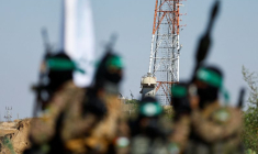 Des combattants palestiniens de la branche armée du Hamas lors d'un défilé militaire à Gaza