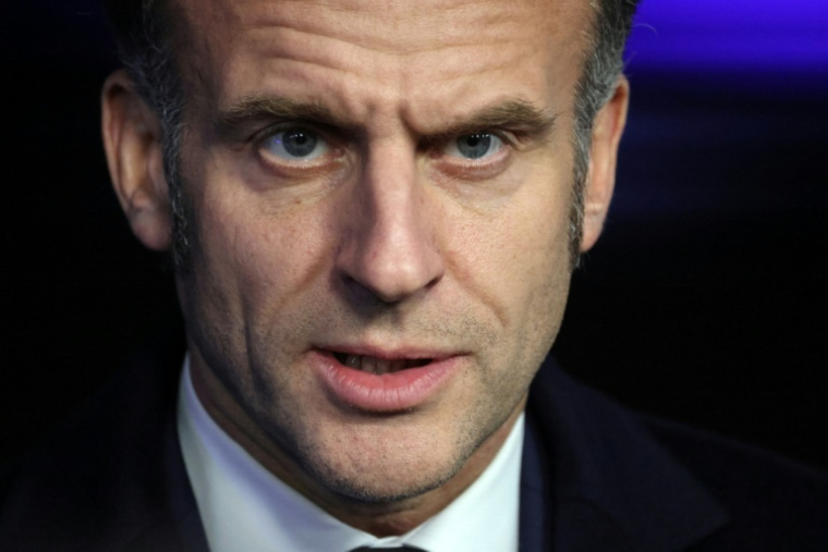 Le président français Emmanuel Macron, le 12 février 2026 à Rijkhoven , en Belgique  ( AFP / Ludovic MARIN )