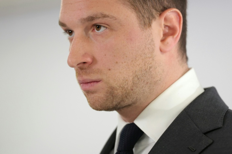 Le président du RN Jordan Bardella lors d'une conférence de presse à Paris le 18 février 2026 ( AFP / Thomas SAMSON )