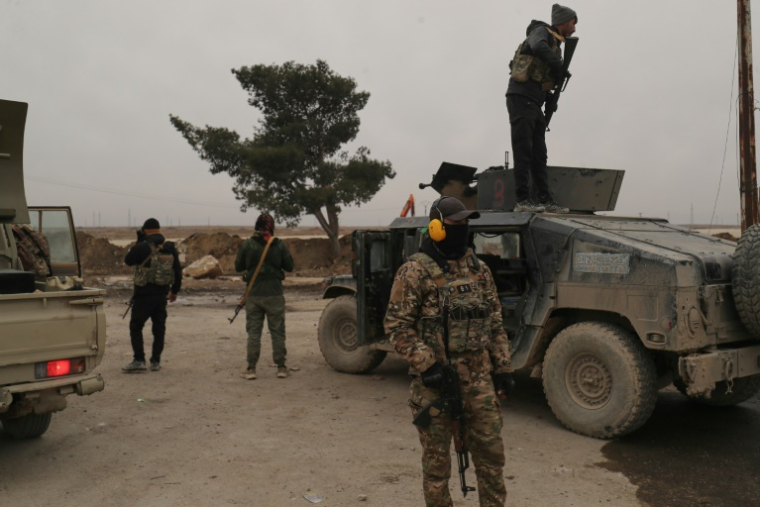 Des membres des Forces démocratiques syriennes (FDS), le 22 janvier 2026 à Hassaké ( AFP / Delil SOULEIMAN )