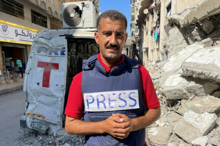 Le journaliste de l'AFP Khader Zaanoun pose pour une photo à Gaza, le 22 juillet 2025 ( AFP / - )
