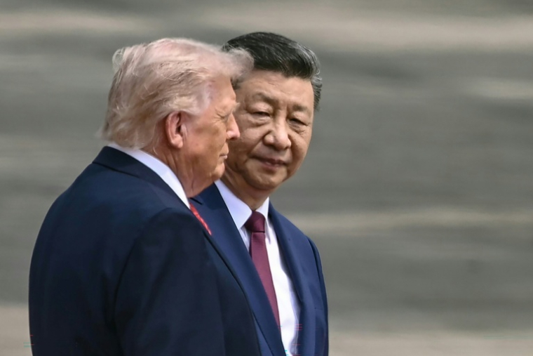 Le président chinois Xi Jinping reçoit son homologue américain Donald Trump à Pékin, le 14 mai 2026 ( AFP / Brendan SMIALOWSKI )