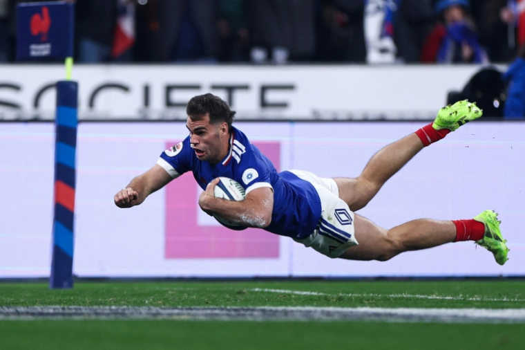 Auteur de deux essais face aux Sud-Africains le 8 novembre 2025 au Stade de France, Damian Penaud est devenu seul le meilleur marqueur d'essais du rugby français, devant la légende Serge Blanco (40 contre 38) ( AFP / FRANCK FIFE )