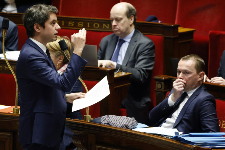 Gabriel Attal et Olivier Dussopt, à l'Assemblée nationale, le 16 février 2023 ( AFP / Ludovic MARIN )