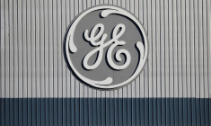 GE TRIPLE SON BÉNÉFICE ET RÉDUIT SES SORTIES DE CAPITAUX