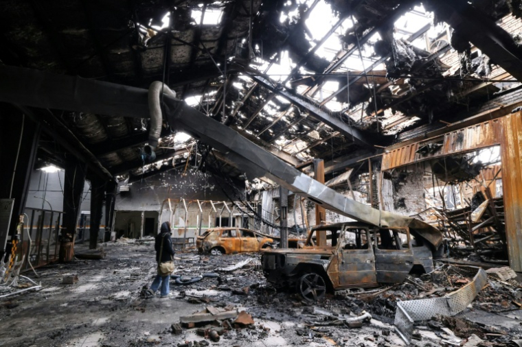 Un garage de Téhéran après un bombardement, le 28 mars 2026 ( AFP / ATTA KENARE )