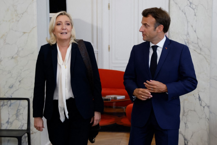 Marine Le Pen et Emmanuel Macron, le 21 juin 2022, à Paris ( POOL / LUDOVIC MARIN )