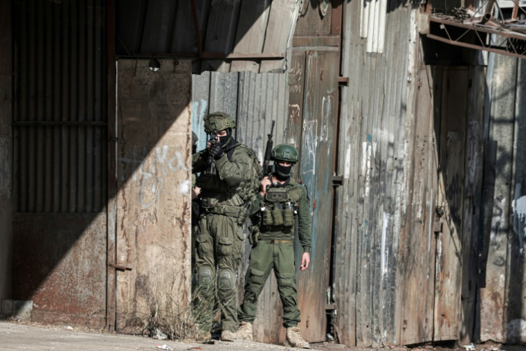 Des soldats israéliens lors d'une opération à Naplouse, en Cisjordanie occupée, le 27 août 2025 ( AFP / Jaafar ASHTIYEH )