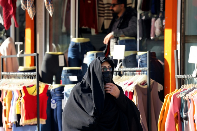 Dans le quartier commerçant de Vali-Asr à Téhéran, le 31 décembre 2025 ( AFP / ATTA KENARE )