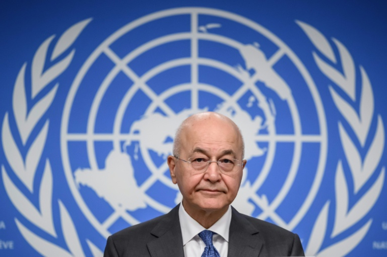 Le Haut-Commissaire aux réfugiés Barham Salih lors d'une conférence de presse le 9 juin 2026 à Genève ( AFP / Fabrice COFFRINI )