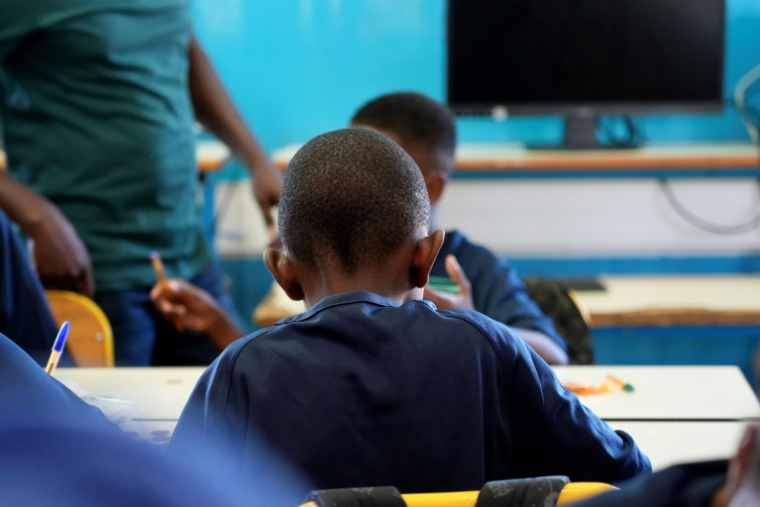 Des élèves d'une école de Mamoudzou, à Mayotte, le 18 août 2025 ( AFP / Marine GACHET )