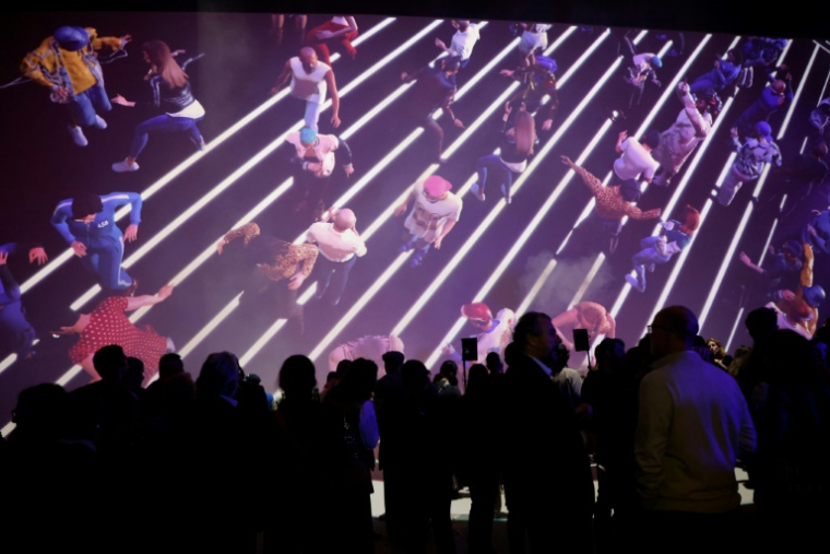 Des visiteurs à l'exposition "Clubbing" au Grand palais immersif à Paris, le 12 mai 2025 ( AFP / Ludovic MARIN )