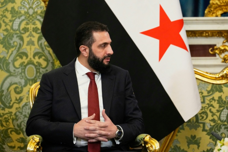Le président syrien par interim Ahmad al-Chareh participe à une rencontre avec le président russe à Moscou le 15 octobre 2025 ( POOL / Alexander Zemlianichenko )