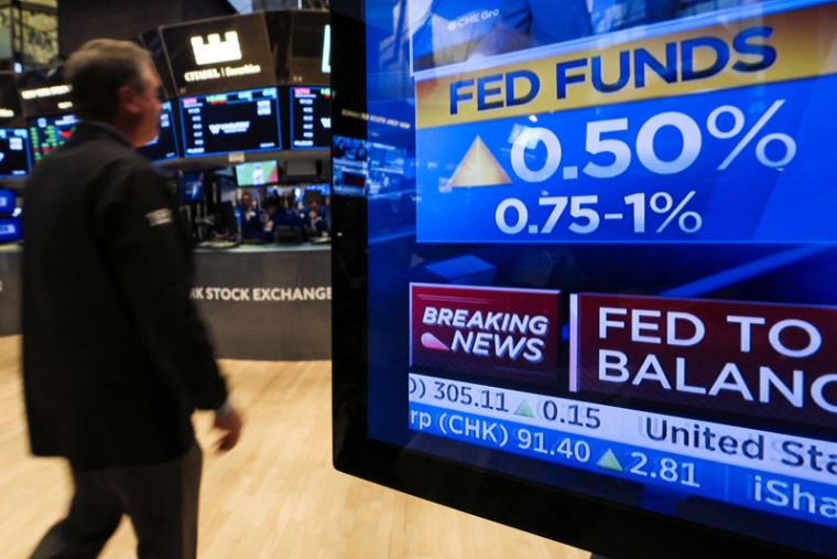ÉTATS-UNIS: LA FED RELÈVE LES TAUX D'UN DEMI-POINT ET VA COMMENCER À RÉDUIRE SON BILAN
