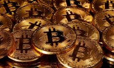 LE BITCOIN, À PLUS DE $18.000, SE RAPPROCHE DE SON RECORD