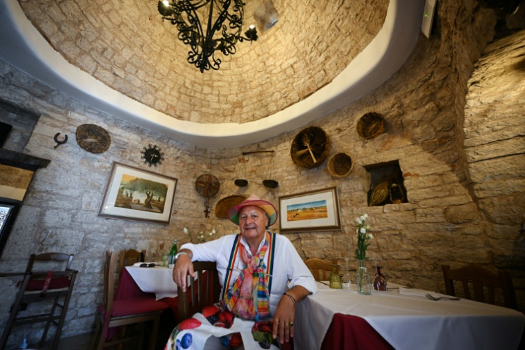 Domenico Laera, le patron d'un restaurant installé dans un trullo à Alberobello, en Italie, le 24 juin 2026 ( AFP / Tiziana FABI )