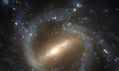 Photo d'une galaxie spirale barrée, ici NGC 1073, prise avec le télescope spatial Hubble et fournie par l'Agence spatiale européenne le 3 février 2012 ( NASA/ESA/HUBBLE / - )