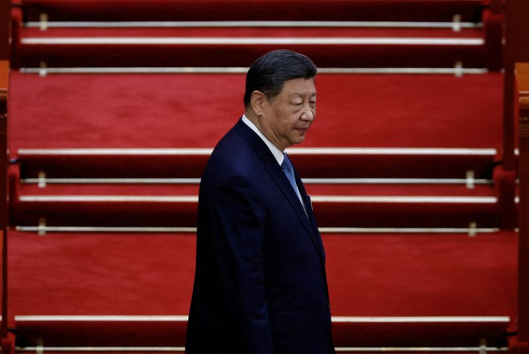 Le président chinois Xi Jinping arrive pour la deuxième session plénière de l'Assemblée nationale populaire (ANP), au Grand Palais du Peuple à Pékin