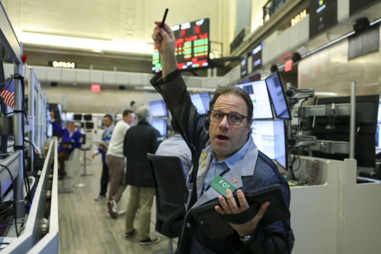 Un opérateur à la Bourse de New York, le 24 mars 2026 ( AFP / ANGELA WEISS )