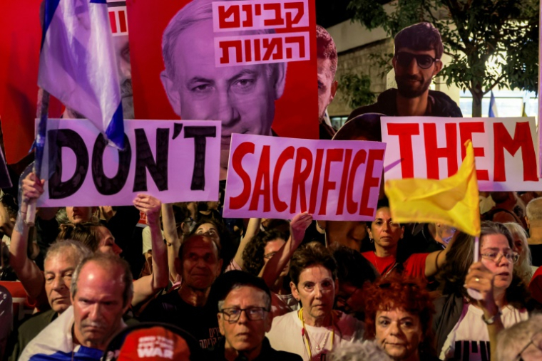 Des Israéliens manifestent à Jérusalem pour appeler à un cessez-le-feu à Gaza et à la libération des otages, le 3 septembre 2025 ( AFP / Menahem Kahana )