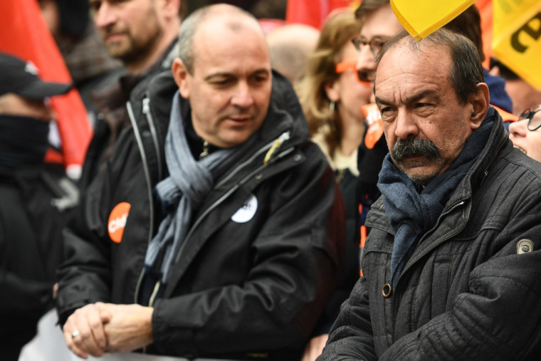 Laurent Berger et Philippe Martinez à Paris, le 11 février 2023. ( AFP / CHRISTOPHE ARCHAMBAULT )