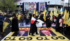 Des manifestants lors de la Journée de Qods, occasion annuelle de manifestations en solidarité avec les Palestiniens, à Téhéran, le 13 mars 2026 ( AFP / - )