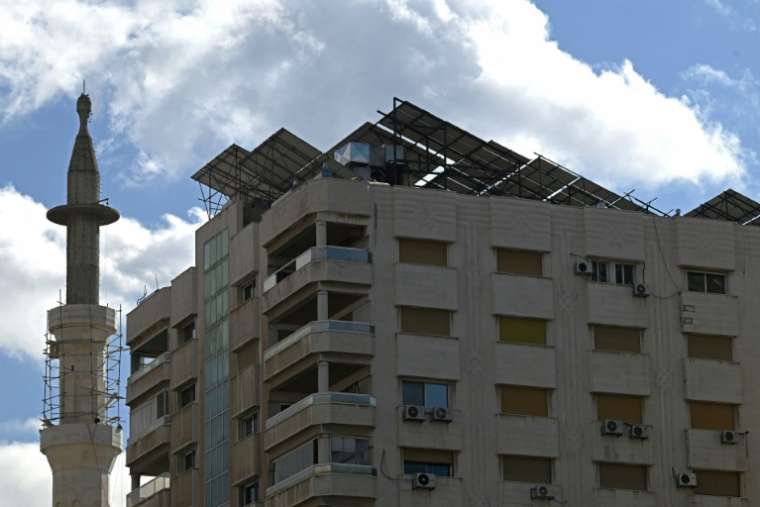 Des panneaux solaires ont été installés à Damas, sur fond de hausse de prix de l'électricité en Syrie, le 29 janvier 2026 ( AFP / LOUAI BESHARA )