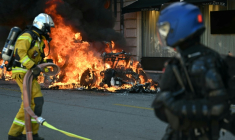 Lors de la manifestation "No-G7" à Genève, le 14 juin 2026 ( AFP / Fabrice COFFRINI )