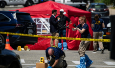 Des agents du FBI enquêtent à l'endroit où un homme a été tué par un agent de l'ICE à Biddeford dans le Maine, le 13 juillet 2026 ( AFP / Joseph Prezioso )