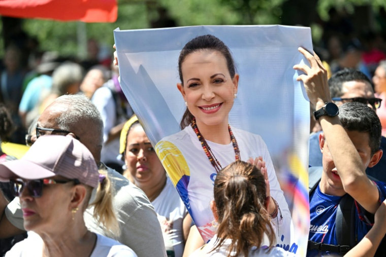 Des manifestants demandent le retour au Venezuela de l'opposante Maria Corina Machado, le 24 septembre 2026 à Caracas ( AFP / Juan BARRETO )