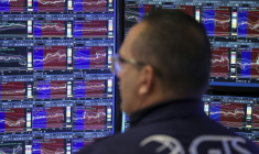 Un opérateur à la Bourse de New York, le 21 novembre 2025 ( AFP / ANGELA WEISS )